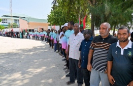 The residential community of Sh. Komandhoo welcoming President Dr Mohamed Muizzu upon his arrival -- Photo: President's Office