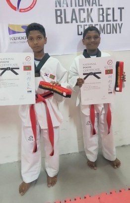 Hoodh (R) and his brother Yoonus (L) who also earned his black belt during last nights ceremony