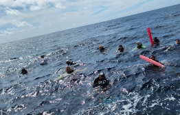 Divers found adrift rescued by the police -- Photo: Police
