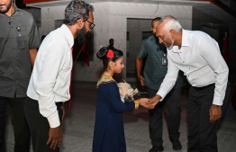 President Muizzu received by the community of R. Meedhoo upon his visit -- Photo: President's Office
