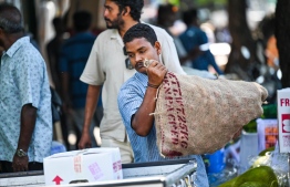 [File] Goods being loaded near the Male' local market area