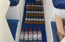 Bottles of alcohol discovered on the launch that was seized by the Police