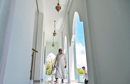 A person enters Masjid Hassan Adam" built in Hulhumale' Phase 2 for Friday prayer congregation -- Photo: Fayaz Moosa