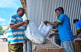 Distribution of staple foods to each household underway, as promised by President Dr Mohamed Muizzu -- Photo: Fayaz Moosa
