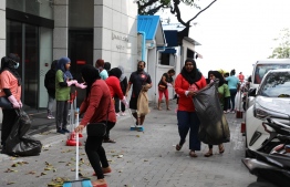 .BML employees engaged in cleaning Male' City -- Photo: Bank of Maldives