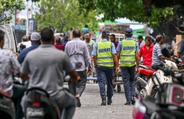 Traffic Police are trying to control the traffic flow, but the attempts are proving futile.-- Photo: Nishan Ali / Mihaaru