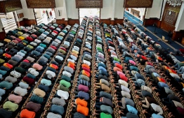 Prayer in congregation at the Islamic Centre -- Photo: Nishan Ali