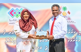 Animal Welfare Ministry's State Minister Mariyam Vishama and Male' Mayor Adam Azim at the ceremony held on Tuesday to mark commencement of work on establishing the cat shelter.-- Photo: Fayaz Moosa / Mihaaru