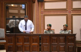 Defence Minister Ghassan answering questions from MPs in parliament yesterday.