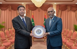 Chairman of the Xizang Autonomous Region, Yan Jinhai (L) meets President Dr. Mohamed Muizzu during his visit to Maldives last November -- Photo: President's Office