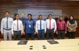 F. Nilandhoo airport land reclamation agreement signing event.