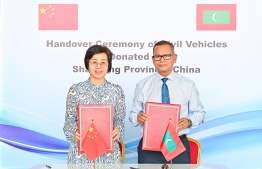 Minister of Cities, Local Government and Public Works Adam Shareef and Chinese Ambassador to the Maldives Wang Lixin at the special ceremony held to hand over the civil vehicles donated by the Chinese government to the Maldives -- Photo: Fayaz Moosa