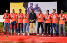 Sports Minister Abdulla Rafiu with Marathon Runners.