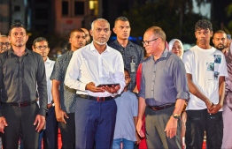 Minister of Cities, Local Government and Public Works Adam Shareef looks on as President Dr Muizzu launches the 'Eid Ali' initiative. -- Photo: Fayaz Moosa / Mihaaru