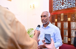 President Dr. Muizzu speaks to the press at his official residence today.