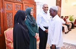 President Dr Muizzu and First Lady Sajida speak with a couple who attended the Eid Greetings event this morning.-- Photo: President's Office