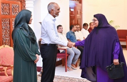 President Dr Muizzu and First Lady Sajida greet a member of the public.-- Photo: President's Office