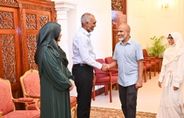 President Dr Muizzu and First Lady Sajida greet Minister of Education Dr Ismail Shafeeu and Family.-- Photo: President's Office