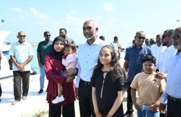 President Muizzu stands for a photo with children -- Photo: President's Office