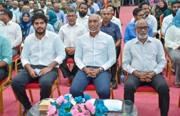 President Dr Muizzu at last night's meeting with residents of Hithadhoo accompanied by Special Advisor Abdul Raheem and PNC Candidate for Central Hithadhoo constituency Azaan.-- Photo: PNC