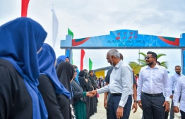 President Dr Muizzu is welcomed by the people of Feeali.-- Photo: President's Office