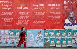Campaign posters featured across streets in the Male region for parliamentary elections 2024. -- Photo: Fayaz Moosa / Mihaaru News