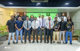 Managing Director of HDC, Ibrahim Fazul Rasheed and Minister of Sports, Abdulla Rafiu with senior officials of Racing and Drift Association after signing the MoU. -- Photo: HDC