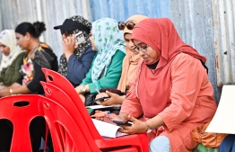 Majilis Election 2024: Observers at work at a polling station.-- Photo: Nishaan Ali / Mihaaru