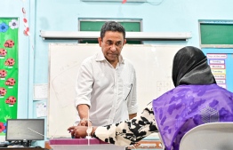 Former President Yameen casting his vote -- Photo: Nishan Ali / Mihaaru
