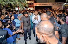 President Dr. Mohamed Muizzu takes part in the gathering held to celebrate PNC's supermajority win in the parliamentary elections held at the Artificial Beach area last night -- Photo: Nishan Ali | Mihaaru