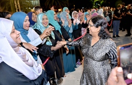 Supporters celebrate PNC candidates victory in the parliamentary elections at Artificial Beach area last night -- Photo: Nishan Ali | Mihaaru