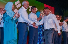 President Muizzu shakes hands with MP Elect Yaseen.