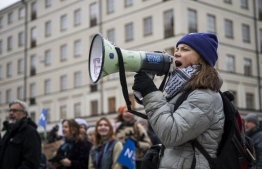 Swedish climate activist Greta Thunberg marches during a 'Fridays for Future' movement climate strike on April 19, 2024, in Stockholm, Sweden. -- Photo: Jonathan Nackstrand / AFP