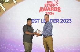 .A BML employee being presented an award at the awarding ceremony held Friday night.