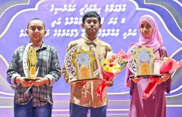The top three winner of the Quran Compeititon held by Himmafushi Council holding their prizes during the awarding ceremony. -- Photo: Fayaz Moosa / Mihaaru News