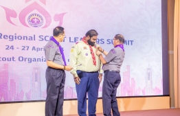 Chief Commissioner of the Scout Association of Maldives, Maeed Mohamed Zahir being presented the award of  Asia Pacific Regional Chairman’s Award by the Chairperson of the Asia Pacific Regional Scouts Committee, Dale Bonkingo Corvera. -- Photo: Scout Association of Maldives