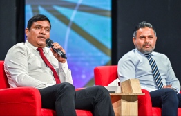 Minister of Fisheries and Ocean Resources, Ahmed Shiyam (R) and Minister of Transport and Civil Aviation, Mohamed Ameen (L) at the 'Ahaa' forum held last night. -- Photo: Fayaz Moosa / Mihaaru News