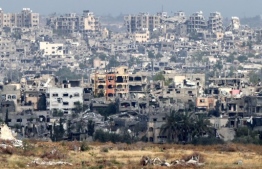 This picture taken from Israel's southern border with the Gaza Strip shows destroyed buildings in the Palestinian territory on May 1, 2024, amid the ongoing conflict between Israel and the militant group Hamas. -- Photo: Jack Guez / AFP