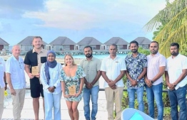 Baa Atoll Police awarded  Jordan Daniel Van Dyk and Daniel De Bruyne with a plaque of appreciation for their selfless act in saving a drowning staff member at Dusit Thani Maldives resort -- Photo: Baa Atoll Police