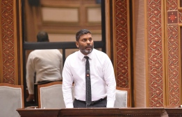 Minister of Sports Abdulla Raafiu answering the questions of MPs at the Parliament -- Photo: Parliament