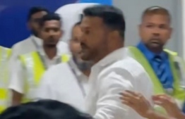 Screengrab from video circulating on social media showing the foreigner who assaulted airport staff.
