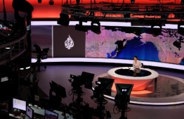 This picture shows a view of the newsroom at the main headquarters of Qatari news broadcaster Al Jazeera in the capital Doha on May 6, 2024. Al Jazeera went off-air in Israel on May 5, after Prime Minister Benjamin Netanyahu's government decided to shut it down following a long-running feud, a move the Qatar-based channel decried as "criminal". -- Photo: KArim Jaafar / AFP