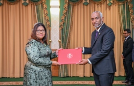President Dr Mohamed Muizzu presenting Geela Ali with the letter of appointment into the post of Ambassador to the Kingdom of Belgium and to the European Union. -- Photo: President's Office