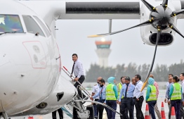 Minister of Transport and Civil Aviation Mohamed Ameen boarding the fourth ATR aircraft of Maldivian Aero brought to Maldives on Wednesday. -- Photo: Nishan Ali / Mihaaru News