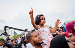 A child participating in an activity during the 'Ufaa Festival' held on Friday inside Hulhumale Central Park to commemorate the national Children's Day. -- Photo: Nishan Ali |Mihaaru News