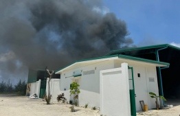 Velidhoo Waste Management Centre on fire on Saturday.-- Photo: MNDF