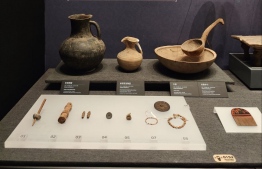 Ancient pottery displayed at the Xinjiang Historical Relics Exhibition