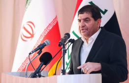 (FILES) A handout picture provided by the Iranian Vice President's Media Office shows Vice President Mohammad Mokhber speaking at the ceremony to lay the foundation stone for the railway connection project at the Shalamcheh border crossing in Iraq's southern province of Basra Governorate on September 2, 2023. Iran's first vice president, Mohammad Mokhber, is expected assume the presidency after Ebrahim Raisi's death in a helicopter crash on May 19, 2024 as the country gears up for early elections. -- Photo: Iranian Vice-Presidency / AFP