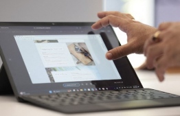 A demonstration of Microsoft's Recall feature on a Surface Pro is pictured following the Microsoft Briefing event in Redmond, Washington on May 20, 2024. (Photo by Jason Redmond / AFP)