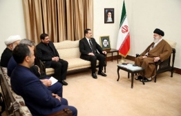 A handout picture provided by the office of Iran's Supreme Leader Ayatollah Ali Khamenei on May 22, 2024, shows him (R) and vice president Mohammad Mokhber, accting as caretaker president (3rd R), meeting with Iraqi Prime Minister Mohammed Shia al-Sudani in Tehran. Khamenei led prayers for late president Ebrahim Raisi on May 22, as huge crowds thronged the capital Tehran for his funeral procession. Raisi and his entourage died in a helicopter crash on May 20. -- Photo: Iranian Supreme Leader's Website/ AFP